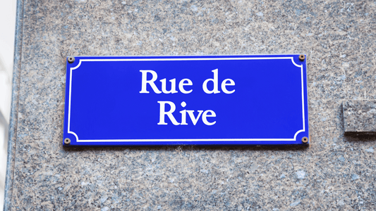 Street sign of Rue de Rive in Geneva, Switzerland